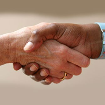 Image of two people handshaking